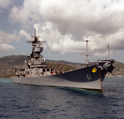 A living USS Iowa (BB-61) battleship, because someone requested me to do it and that more living machines makes it better besides its not some human wearing a ship costume but a sentient and alive warship which actually makes it better, oh, he's a male too