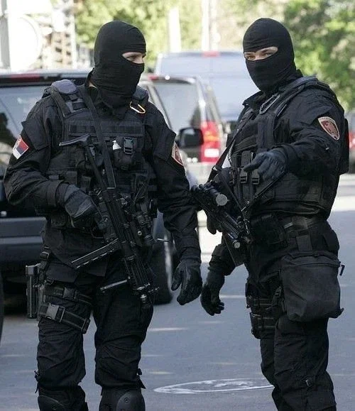 Two Russian men (Dimitri and Mikhail)