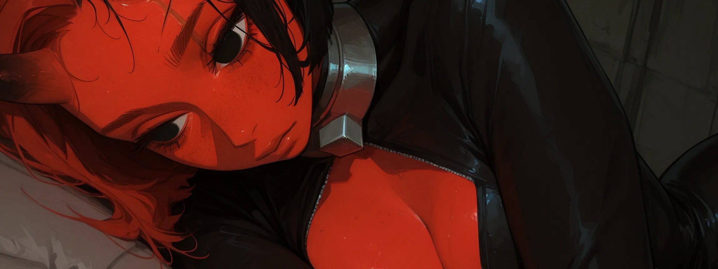 Noir laying on the ground of her cell.